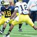 Michigan running back DeAnthony Hardison looks to run the ball around safety Allen Gant during spring practice at Michigan Stadium on Saturday, April 13, 2013. Melanie Maxwell I AnnArbor.com
